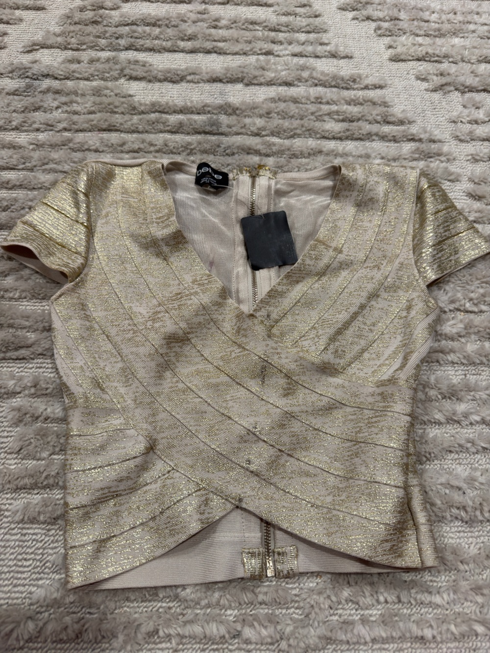 Free with $25+ purchase bebe Metallic Gold and Cream Short Sleeve Knit Top